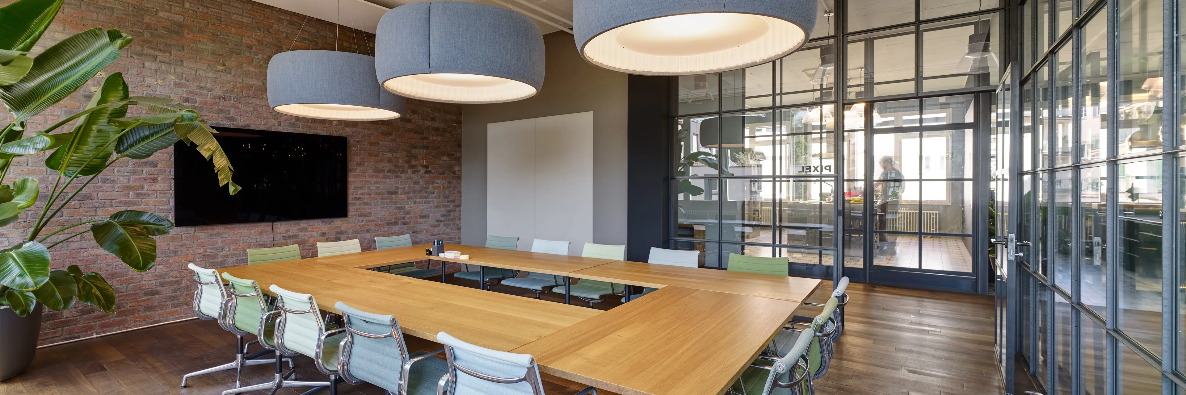 Modern and well-equipped meeting room at Ginetta Workspace, showcasing a professional setting for business discussions and collaborative work.